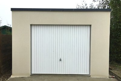 Garage Indépendant Toit terrasse béton enduit Doizon par Abridis